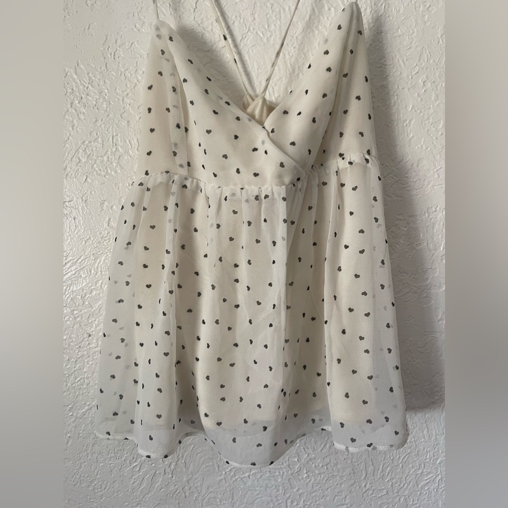 Pretty top from Mango with mini hearts printed. Size XS.